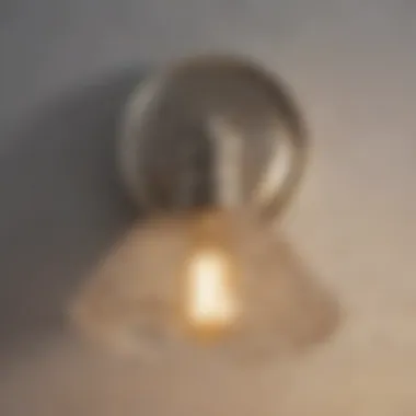 Close-up of a brushed nickel vanity light showcasing its finish