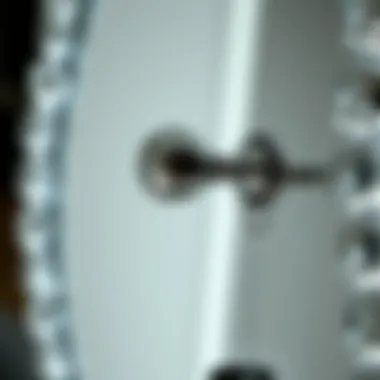 Close-up of a textured chrome mirror showcasing intricate design details