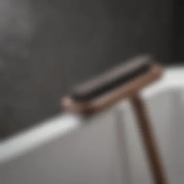 A person demonstrating the effective use of a long cleaning brush in a bathtub