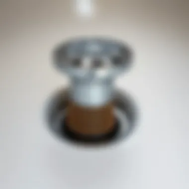 Close-up of a pop-up sink drain stopper