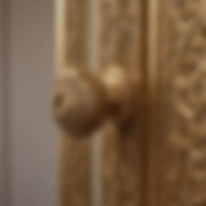 Close-up of intricate patterns on a gold door handle