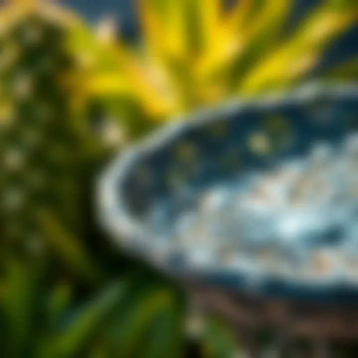 Close-up of intricate designs on a metal bird bath