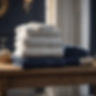 Various material choices for navy and white bath towels displayed